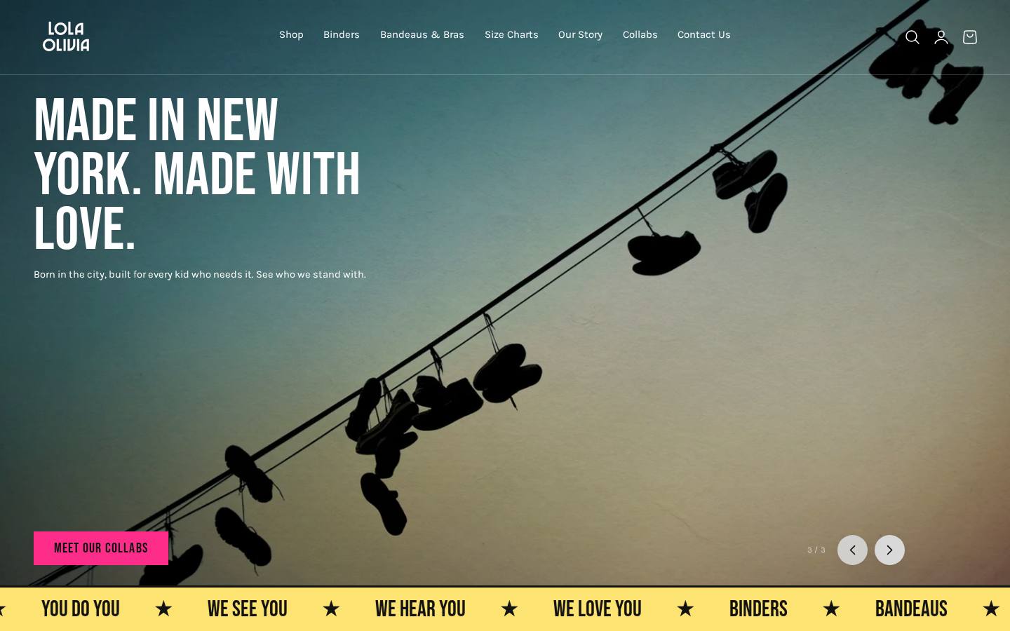 The Lola Olivia home page after the rebuild, showing sneakers hanging from a wire, the navigation, and a yellow marquee reading you do you, we see you, we hear you, we love you